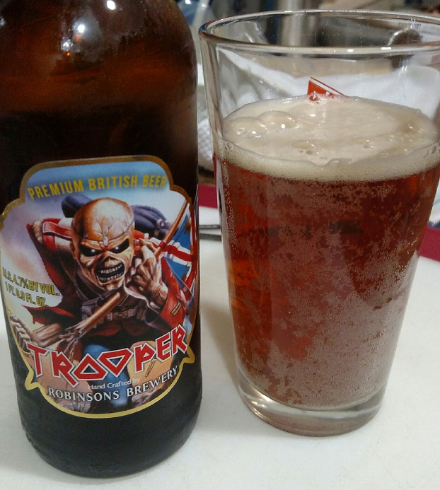 Trooper Beer after opening and pouring Trooper Beer after opening and pouring